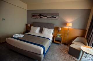 Отель Holiday Inn - Aktau - Seaside Актау Номер Делюкс для некурящих с 1 кроватью размера "king-size"-11