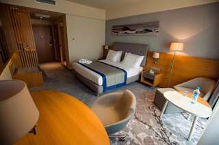 Отель Holiday Inn - Aktau - Seaside Актау Номер Делюкс для некурящих с 1 кроватью размера "king-size"-14